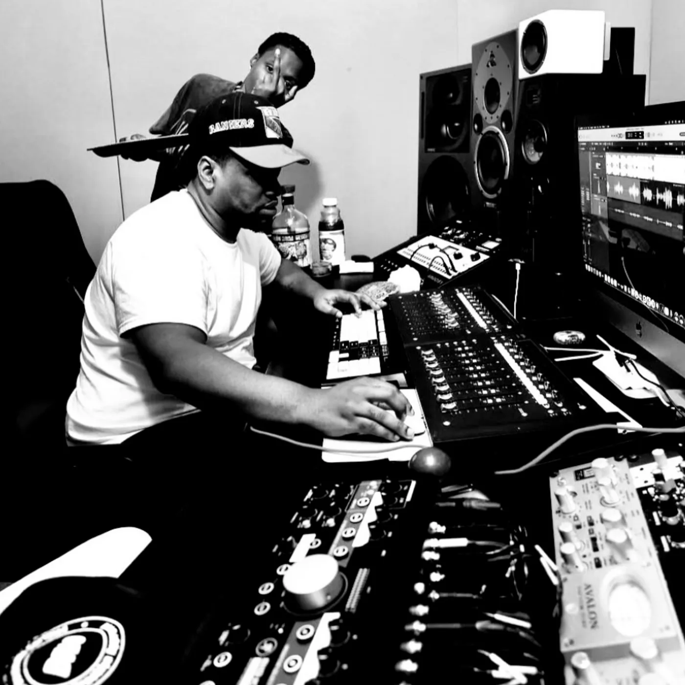 Engineers working the console at Traphouse Studios